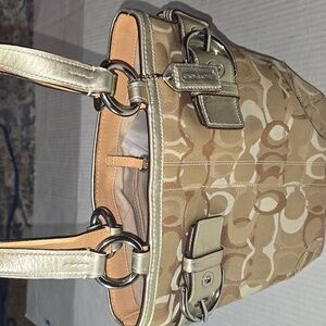Coach Gold and Tan Shoulder Bag with Monogram Pattern and Rounded Shape